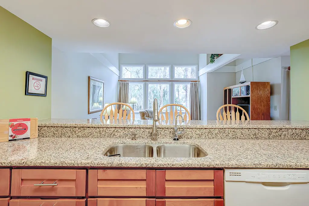 Coastal townhome with riverfront views, deck, & W/D - pool and athletic courts