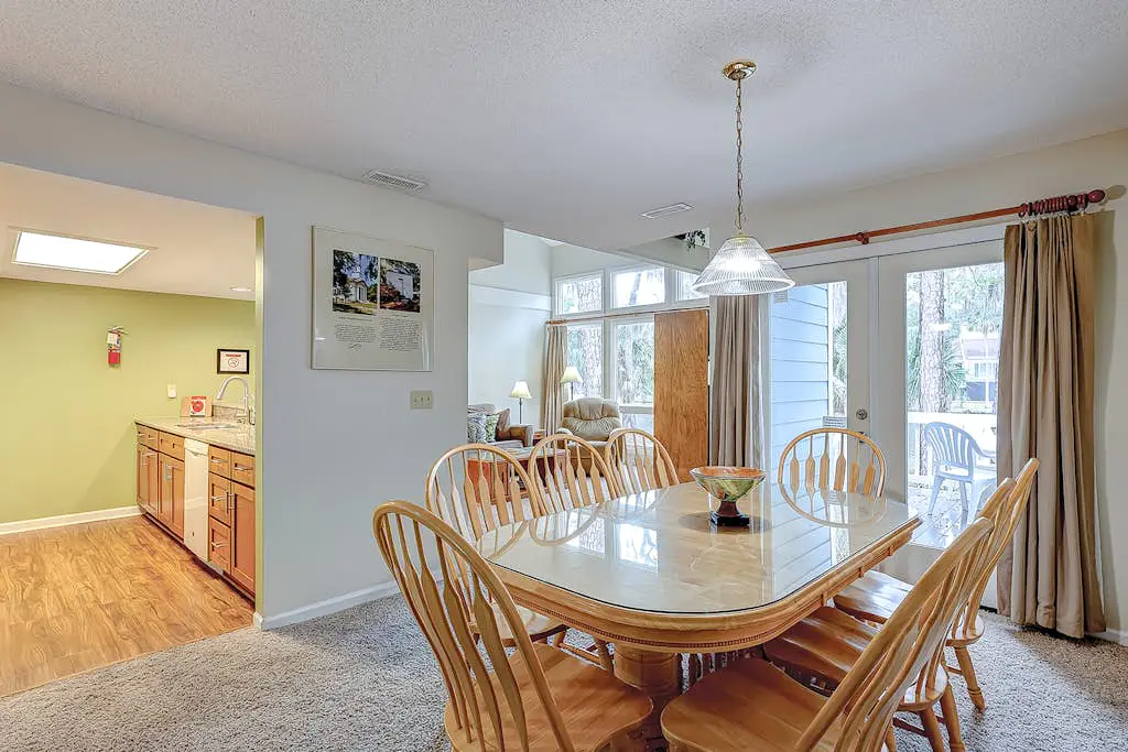 Coastal townhome with riverfront views, deck, & W/D - pool and athletic courts