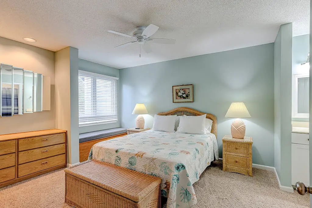 Coastal townhome with riverfront views, deck, & W/D - pool and athletic courts