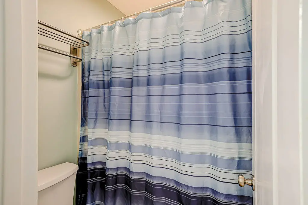 Coastal townhome with riverfront views, deck, & W/D - pool and athletic courts