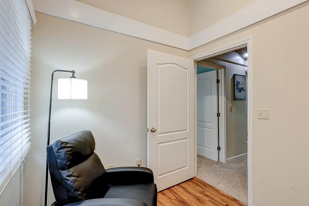 Coastal townhome with riverfront views, deck, & W/D - pool and athletic courts