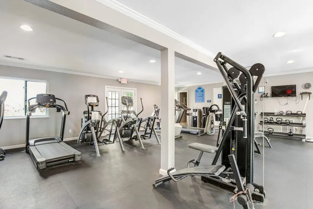 Coastal townhome with riverfront views, deck, & W/D - pool and athletic courts