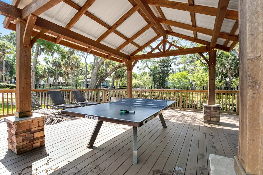 Coastal townhome with riverfront views, deck, & W/D - pool and athletic courts