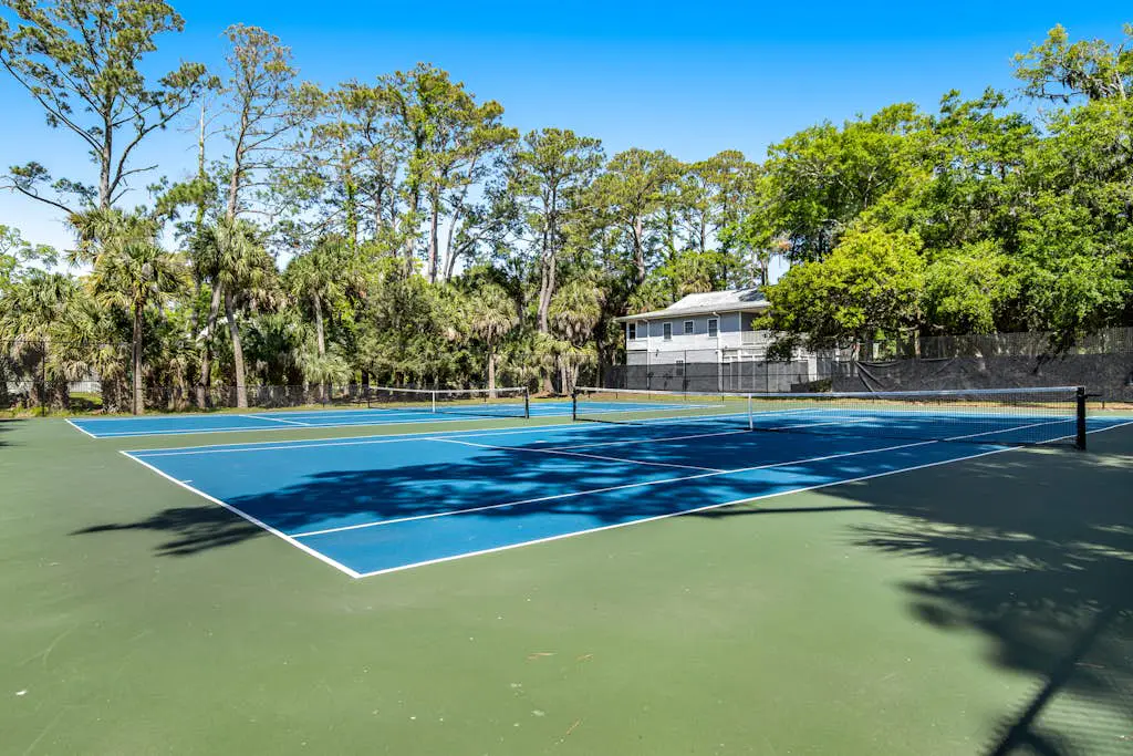 Coastal townhome with riverfront views, deck, & W/D - pool and athletic courts