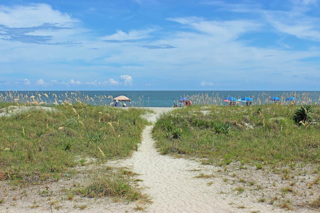 Airy, lagoon-view condo with pool, hot tub & tennis - walk to the beach