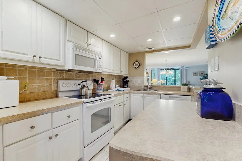 Airy, lagoon-view condo with pool, hot tub & tennis - walk to the beach