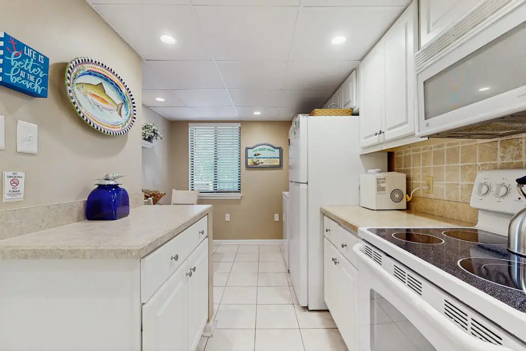 Airy, lagoon-view condo with pool, hot tub & tennis - walk to the beach