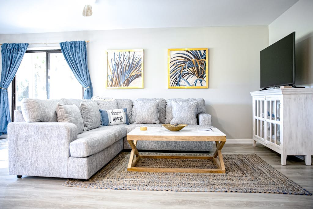 Golf course adjacent, beach-themed condo with sunroom, washer/dryer, & AC