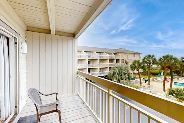 Beach-view condo in oceanfront complex with outdoor pool, beach access, balcony