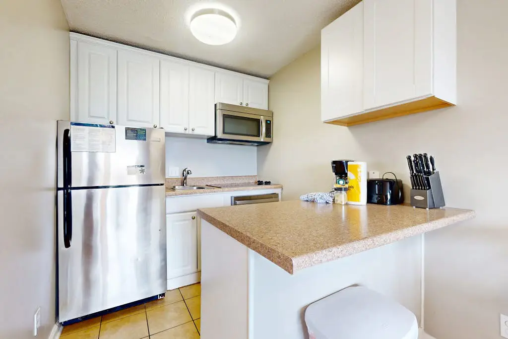 Beach-view condo in oceanfront complex with outdoor pool, beach access, balcony