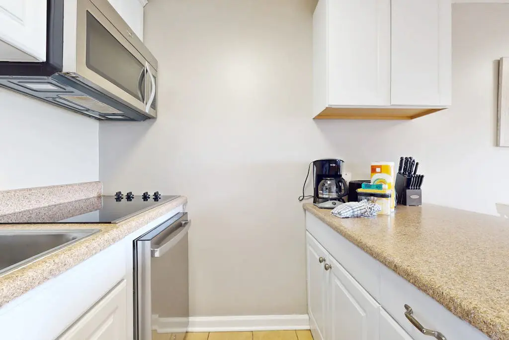 Beach-view condo in oceanfront complex with outdoor pool, beach access, balcony