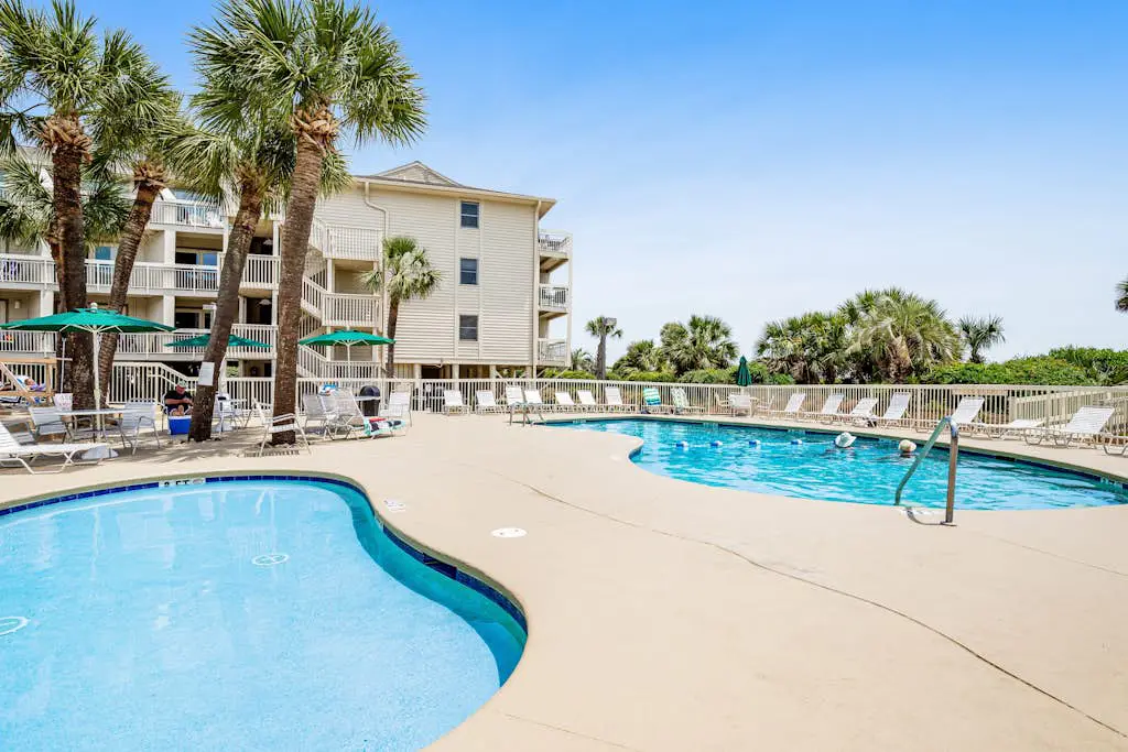 Beach-view condo in oceanfront complex with outdoor pool, beach access, balcony