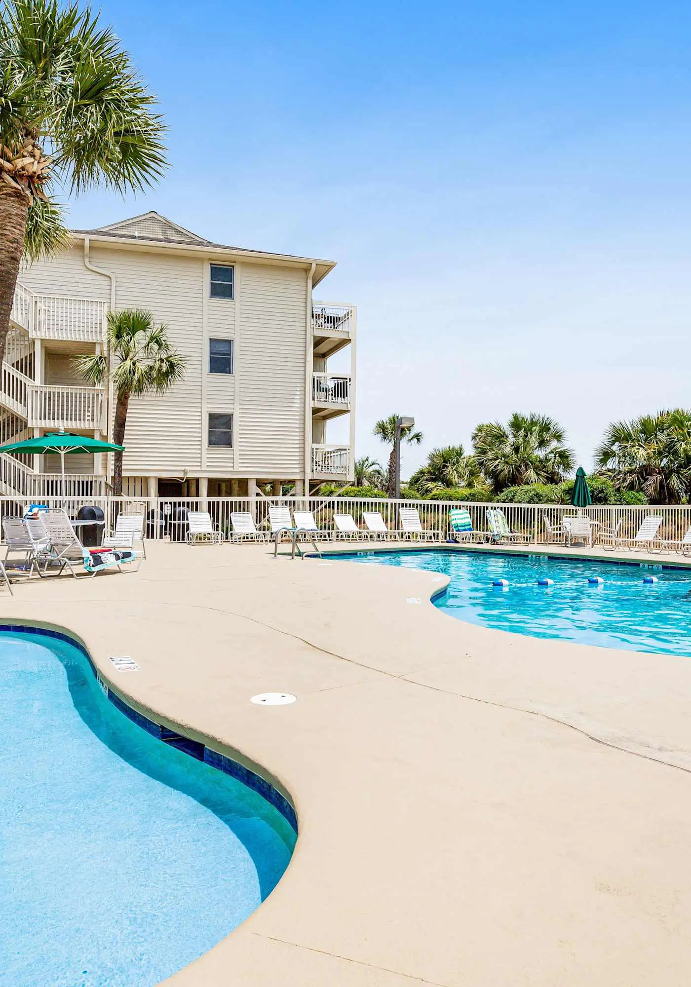 Beach-view condo in oceanfront complex with outdoor pool, beach access, balcony