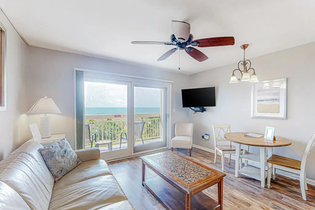 Condo with Coligny Beach views, outdoor pool, beach access, balcony, W/D, & AC
