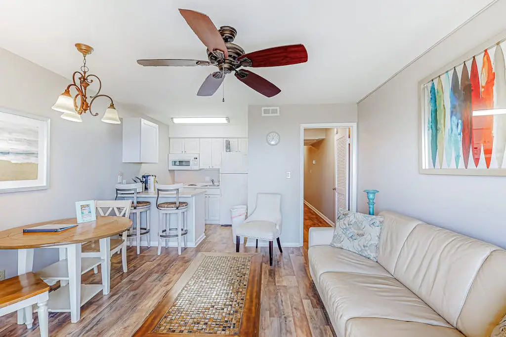 Condo with Coligny Beach views, outdoor pool, beach access, balcony, W/D, & AC