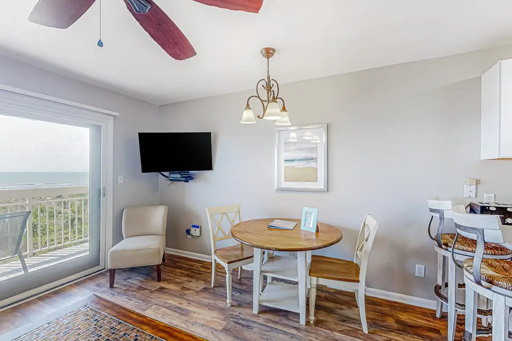 Condo with Coligny Beach views, outdoor pool, beach access, balcony, W/D, & AC