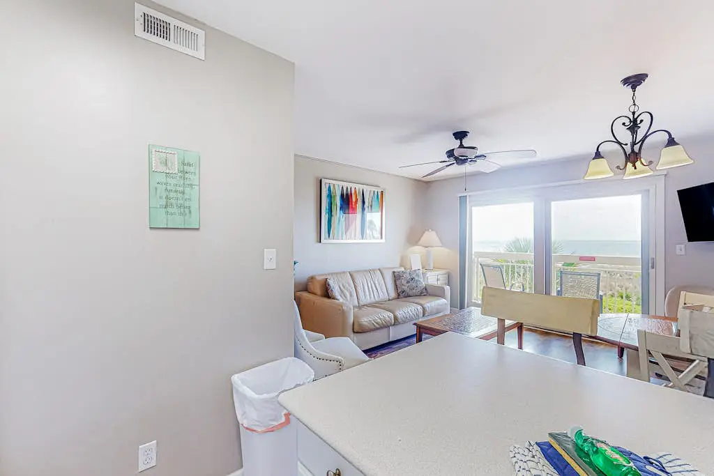 Condo with Coligny Beach views, outdoor pool, beach access, balcony, W/D, & AC