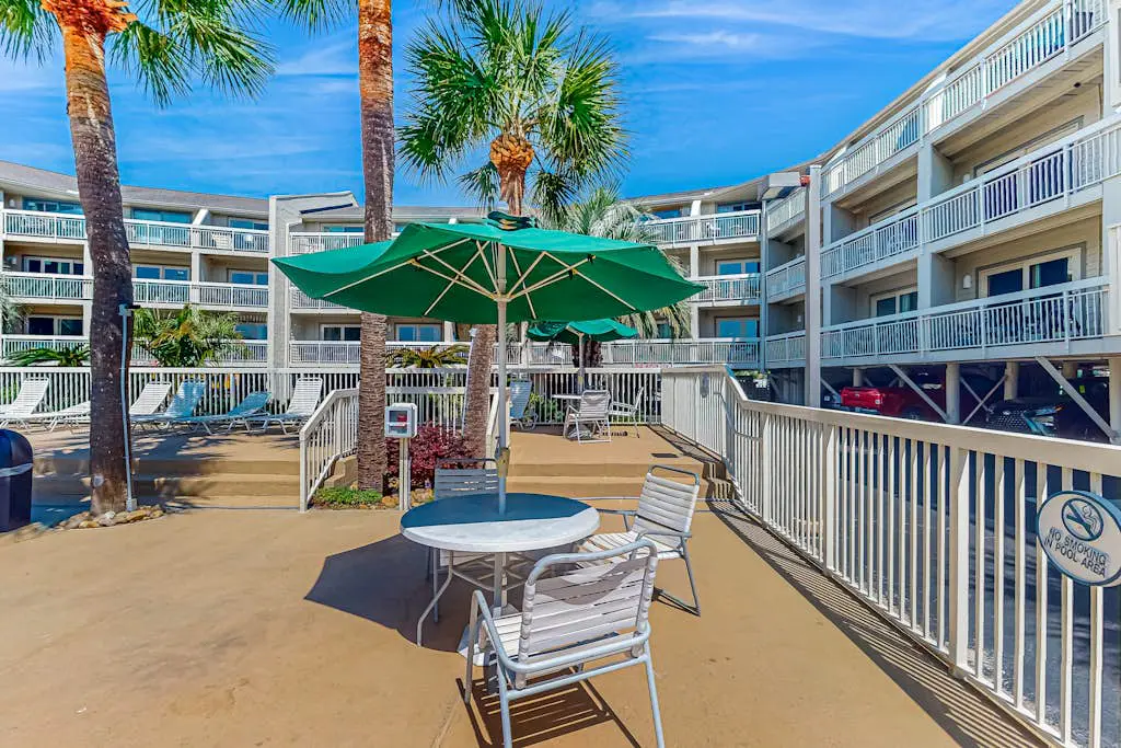 Condo with Coligny Beach views, outdoor pool, beach access, balcony, W/D, & AC