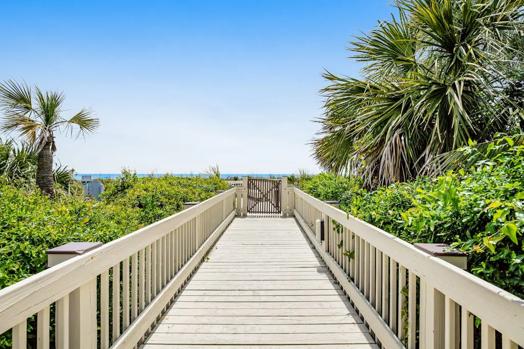 Condo with Coligny Beach views, outdoor pool, beach access, balcony, W/D, & AC