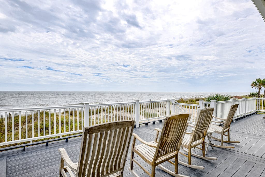 Luxe oceanfront home with dazzling beach views, screened porch & elevator