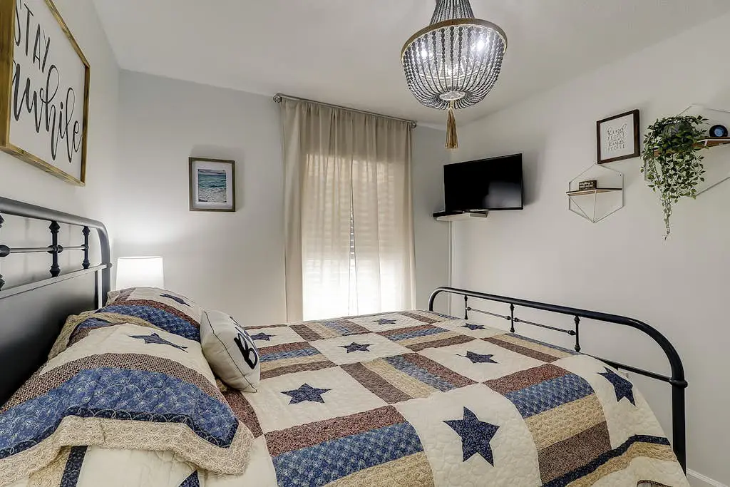 Second-floor condo in beachfront complex with pools, tennis & gym