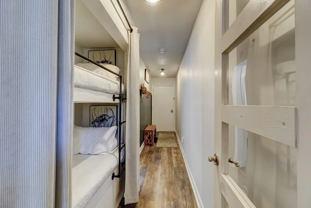 Second-floor condo in beachfront complex with pools, tennis & gym
