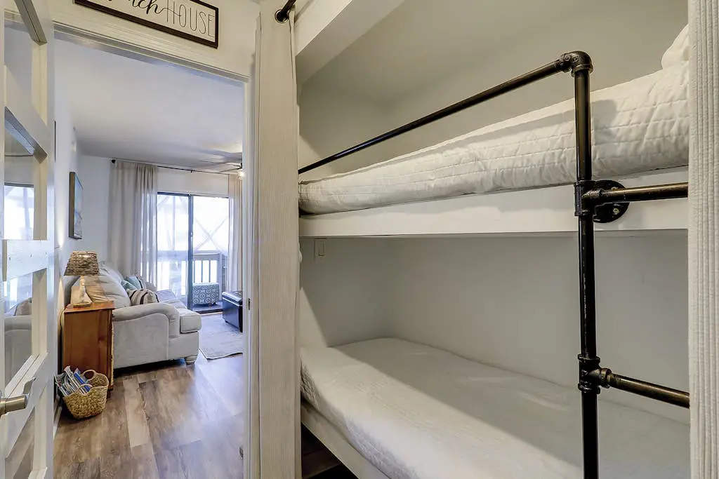 Second-floor condo in beachfront complex with pools, tennis & gym