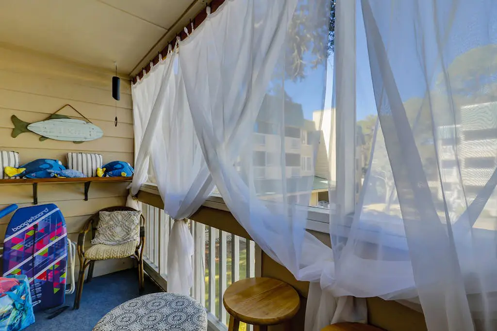 Second-floor condo in beachfront complex with pools, tennis & gym