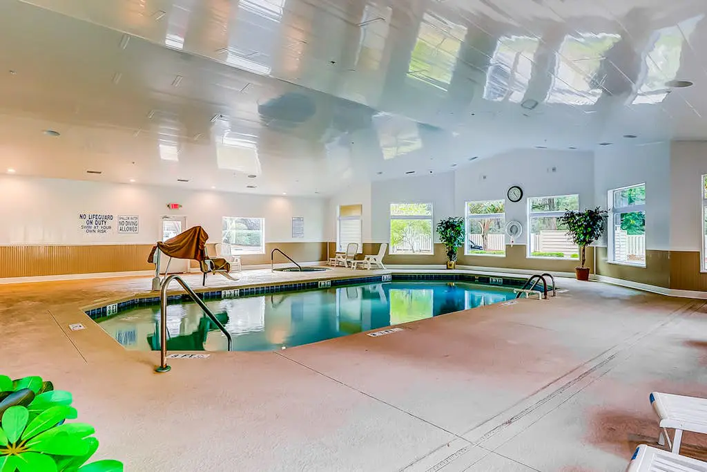 Second-floor condo in beachfront complex with pools, tennis & gym