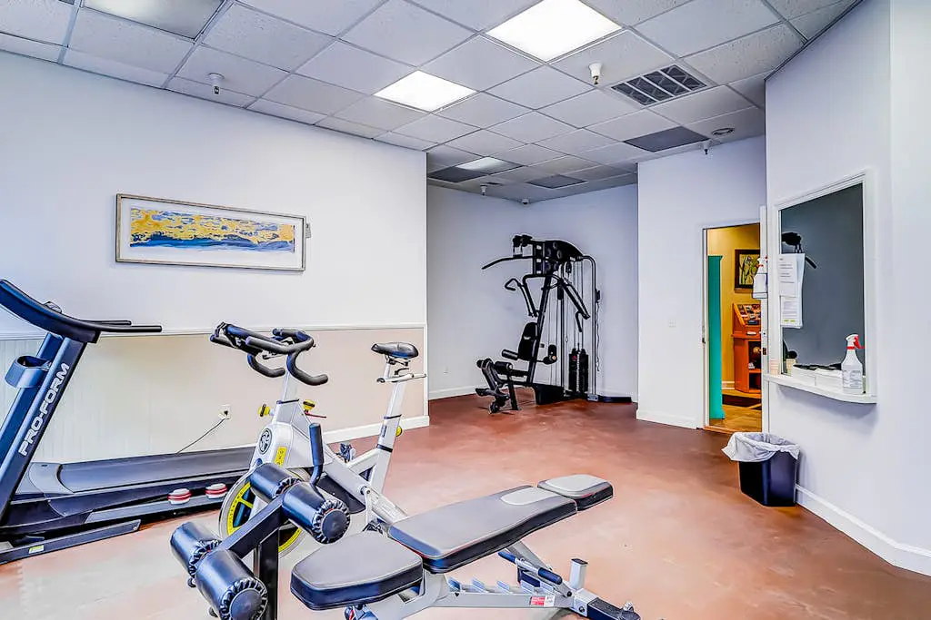 Second-floor condo in beachfront complex with pools, tennis & gym