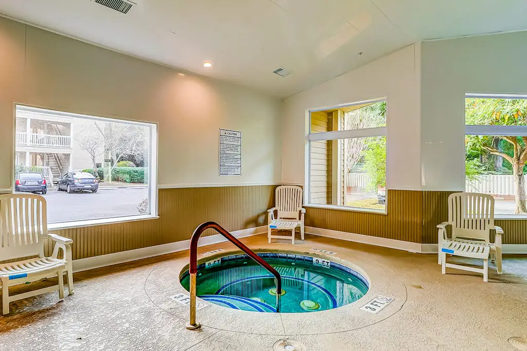 Second-floor condo in beachfront complex with pools, tennis & gym