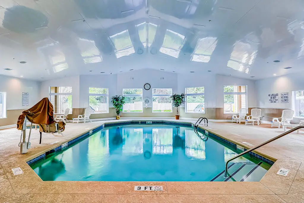Second-floor condo in beachfront complex with pools, tennis & gym