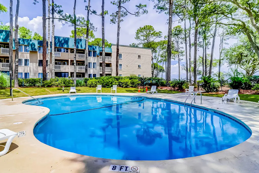 Second-floor condo in beachfront complex with pools, tennis & gym