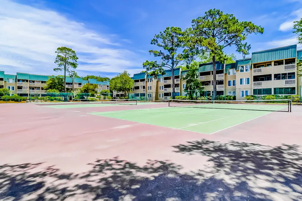 Second-floor condo in beachfront complex with pools, tennis & gym