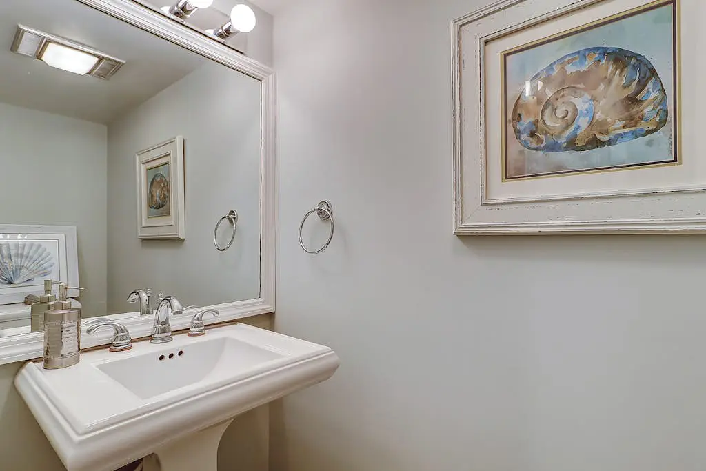 Waterfront condo with seasonal pools, hot tub, balcony, AC, & WD