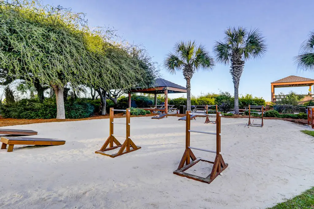Waterfront condo with seasonal pools, hot tub, balcony, AC, & WD