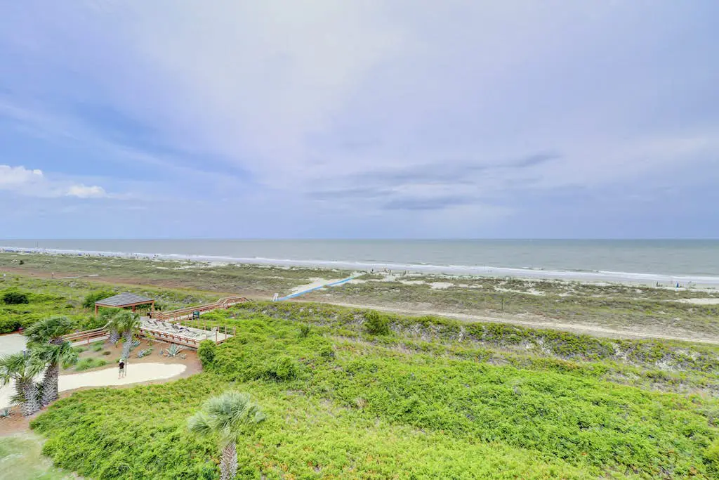 Amazing oceanfront 2BR 2BA 1st floor condo with pool, hot tub, tennis, fitness area, & WD