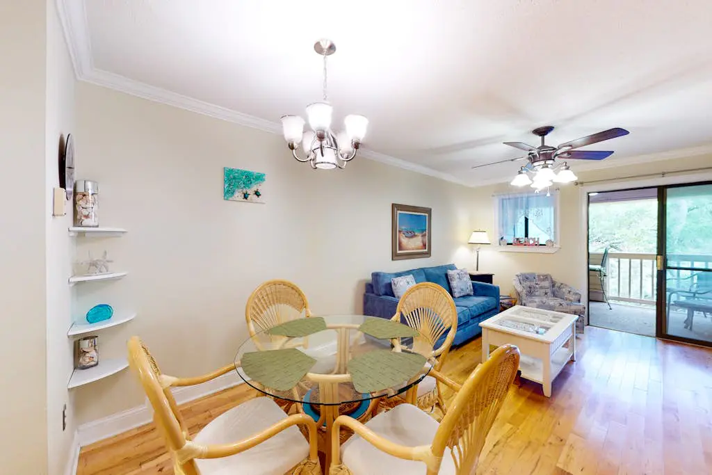 3rd-floor condo with water views, balcony, pools, gym, & beach access