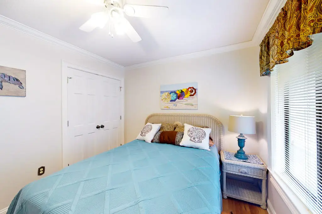 3rd-floor condo with water views, balcony, pools, gym, & beach access