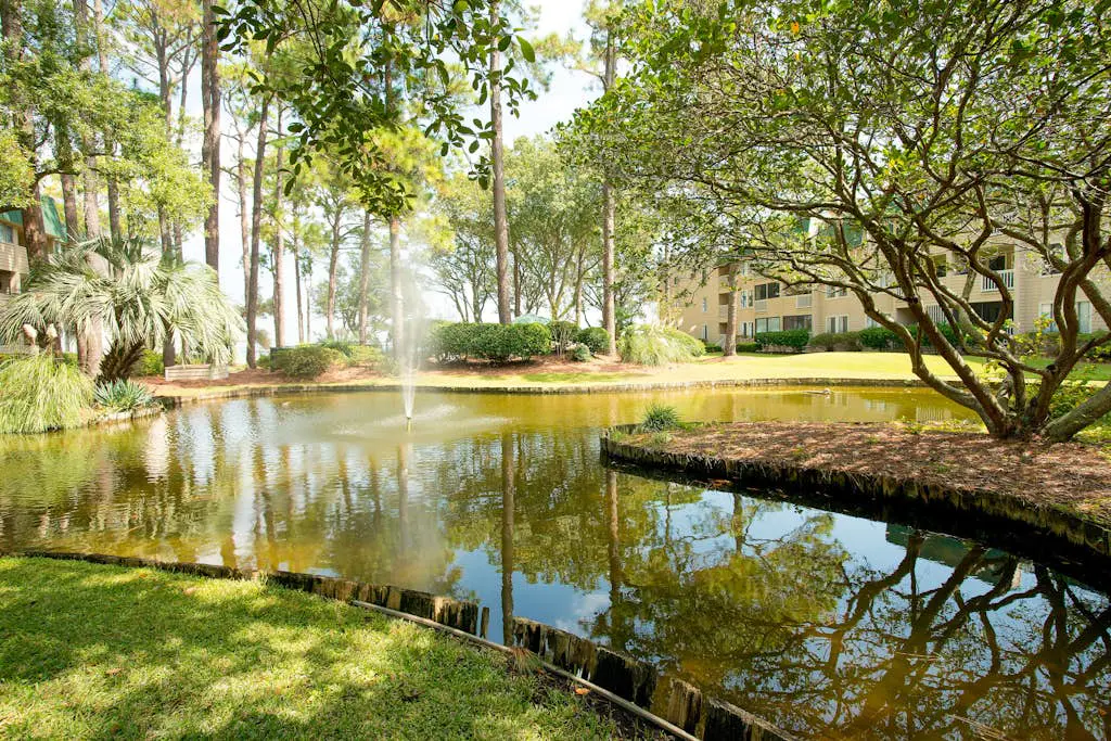 3rd-floor condo with water views, balcony, pools, gym, & beach access