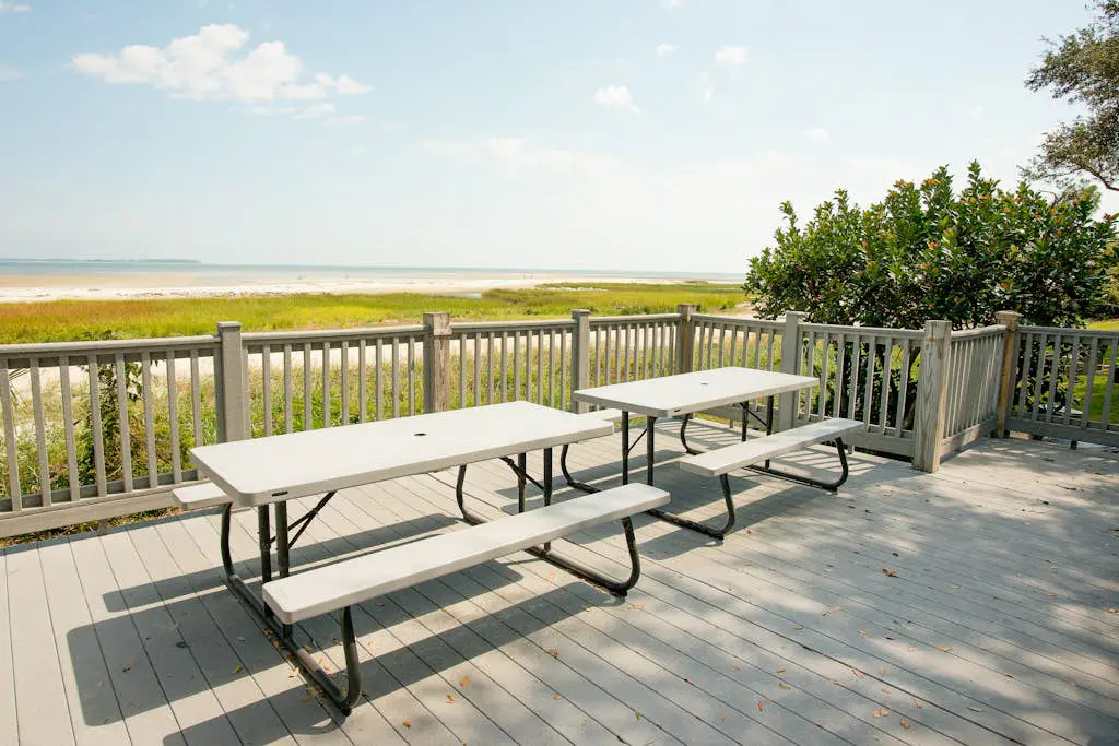 3rd-floor condo with water views, balcony, pools, gym, & beach access