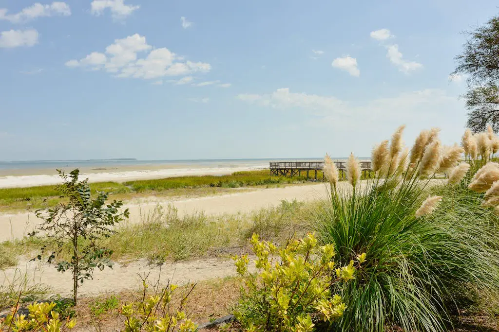 3rd-floor condo with water views, balcony, pools, gym, & beach access