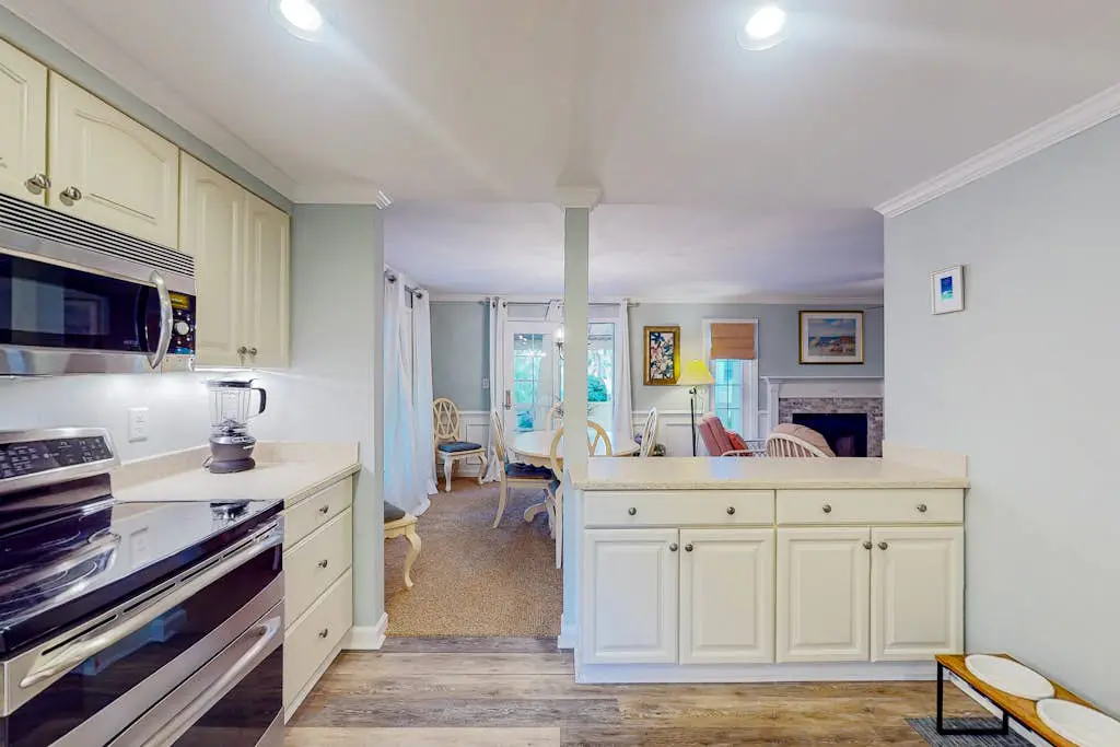 Dog-friendly villa with pool, tennis, pickleball, on-site golf, deck, & W/D