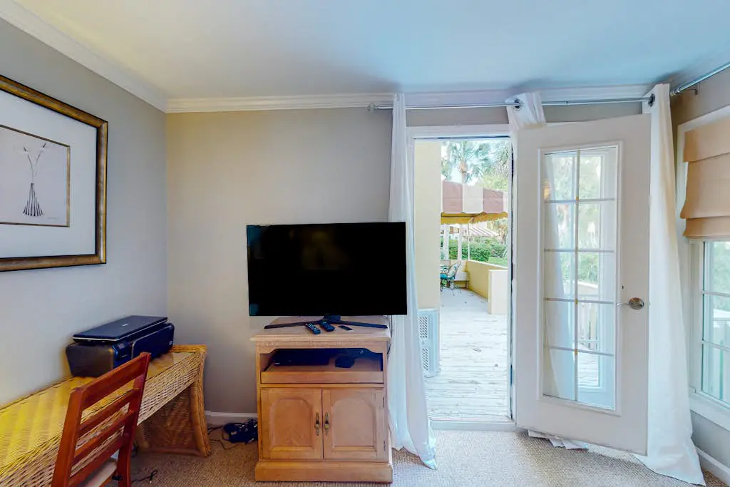 Dog-friendly villa with pool, tennis, pickleball, on-site golf, deck, & W/D