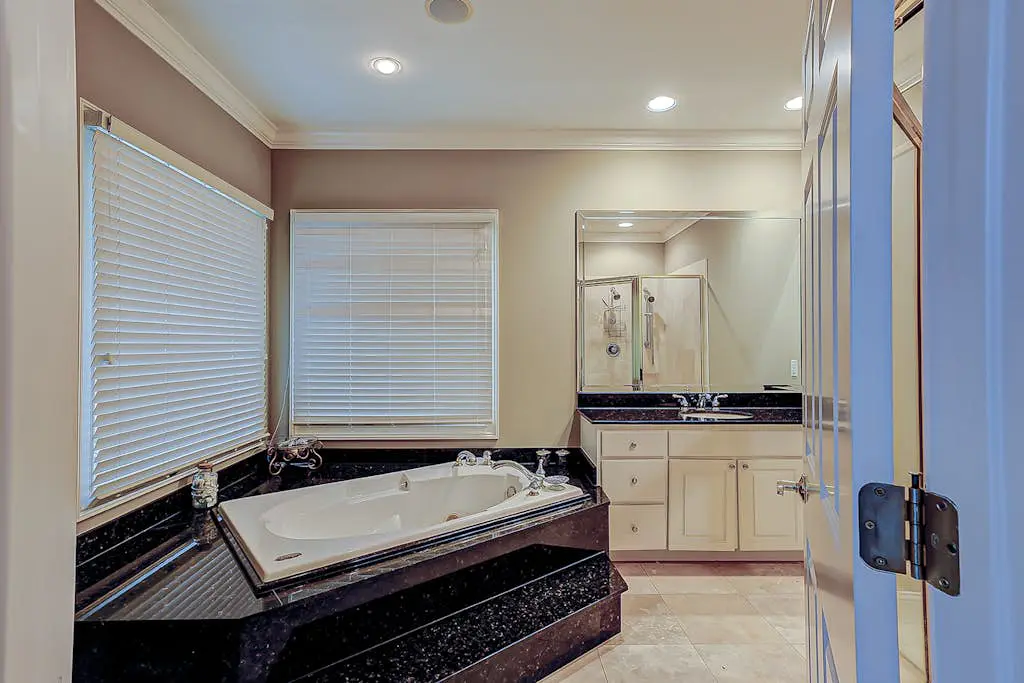 Beachfront beauty with pool access - fireplaces, jetted tub, balconies, & W/D