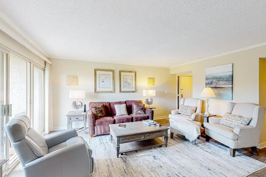 Bay-view condo with balcony, AC, & W/D - walk to beach