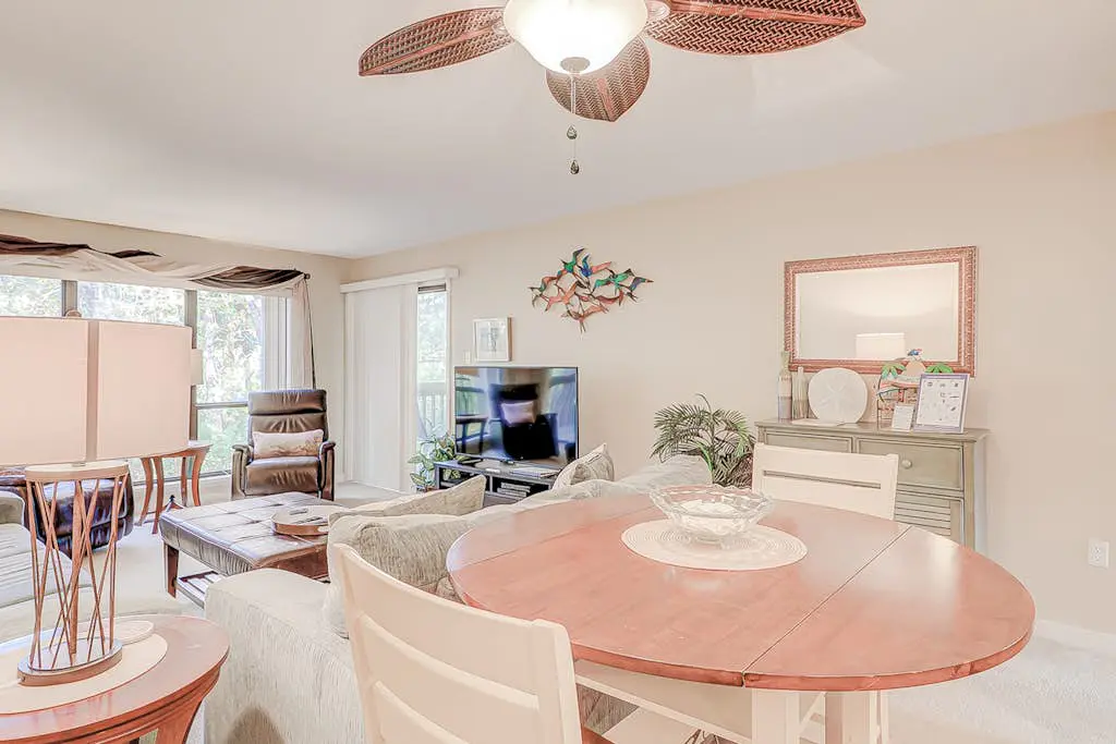 Dog-friendly condo with pool, central AC, & washer/dryer - quick walk to beach