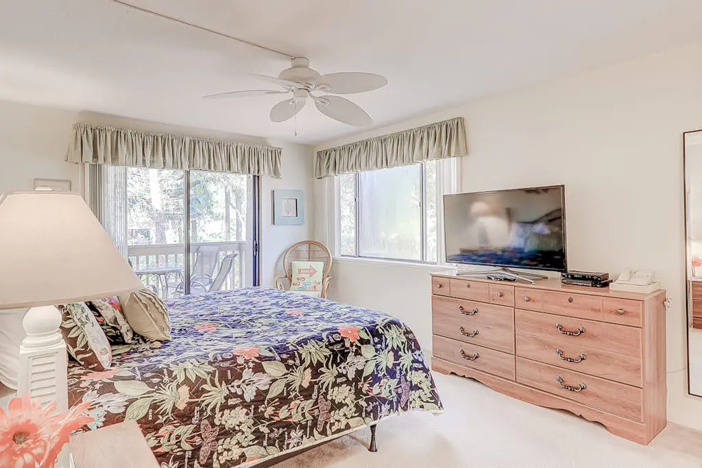 Dog-friendly condo with pool, central AC, & washer/dryer - quick walk to beach