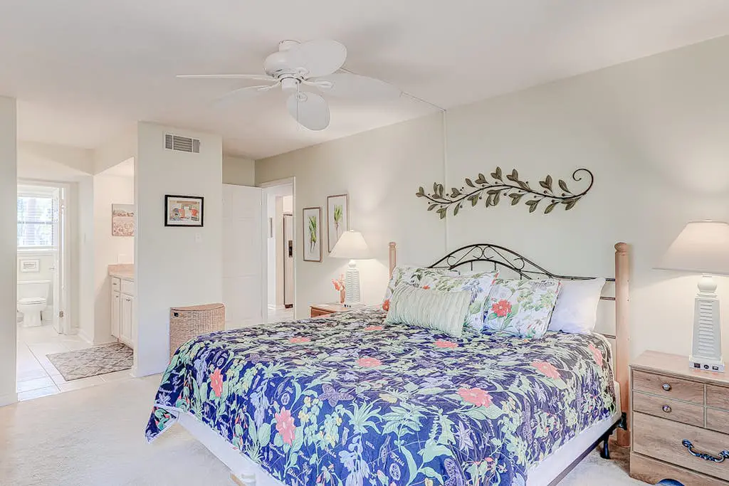 Dog-friendly condo with pool, central AC, & washer/dryer - quick walk to beach
