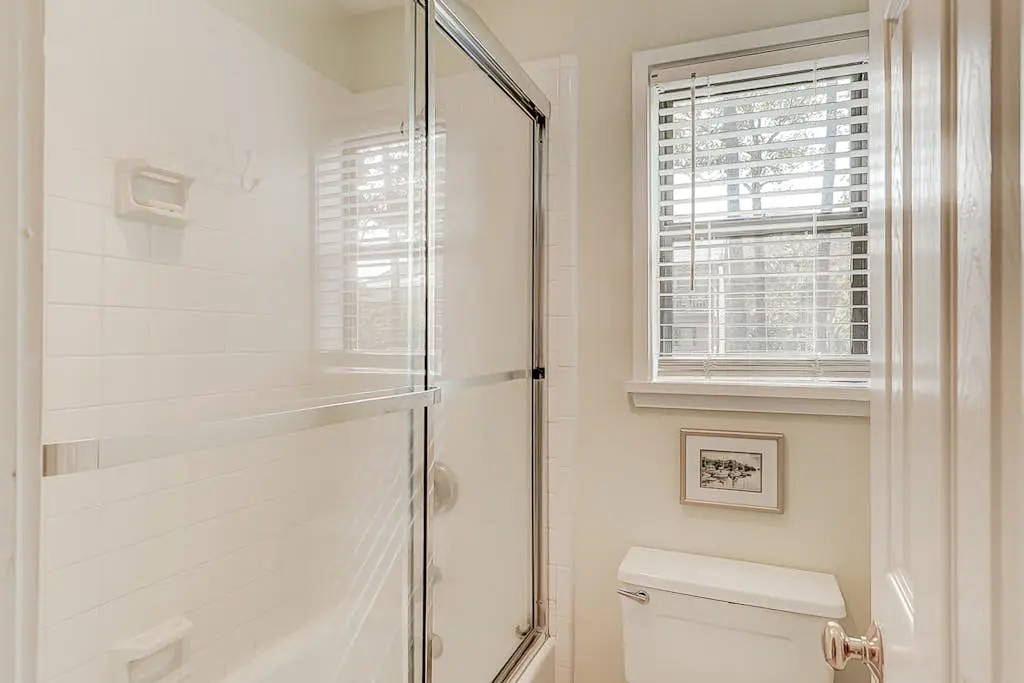 Dog-friendly condo with pool, central AC, & washer/dryer - quick walk to beach